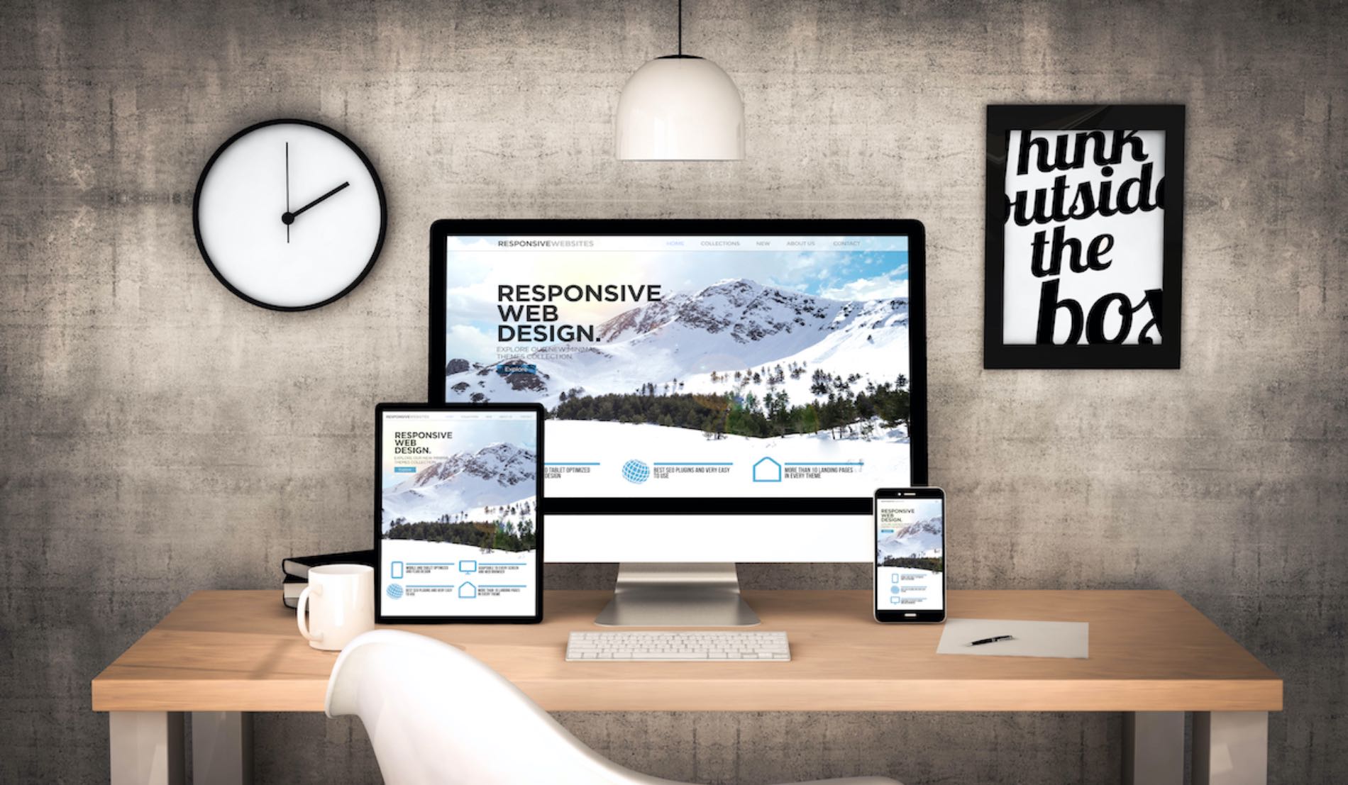 Responsive Web Design - tablet, desktop, and mobile phone on desk displaying the same website