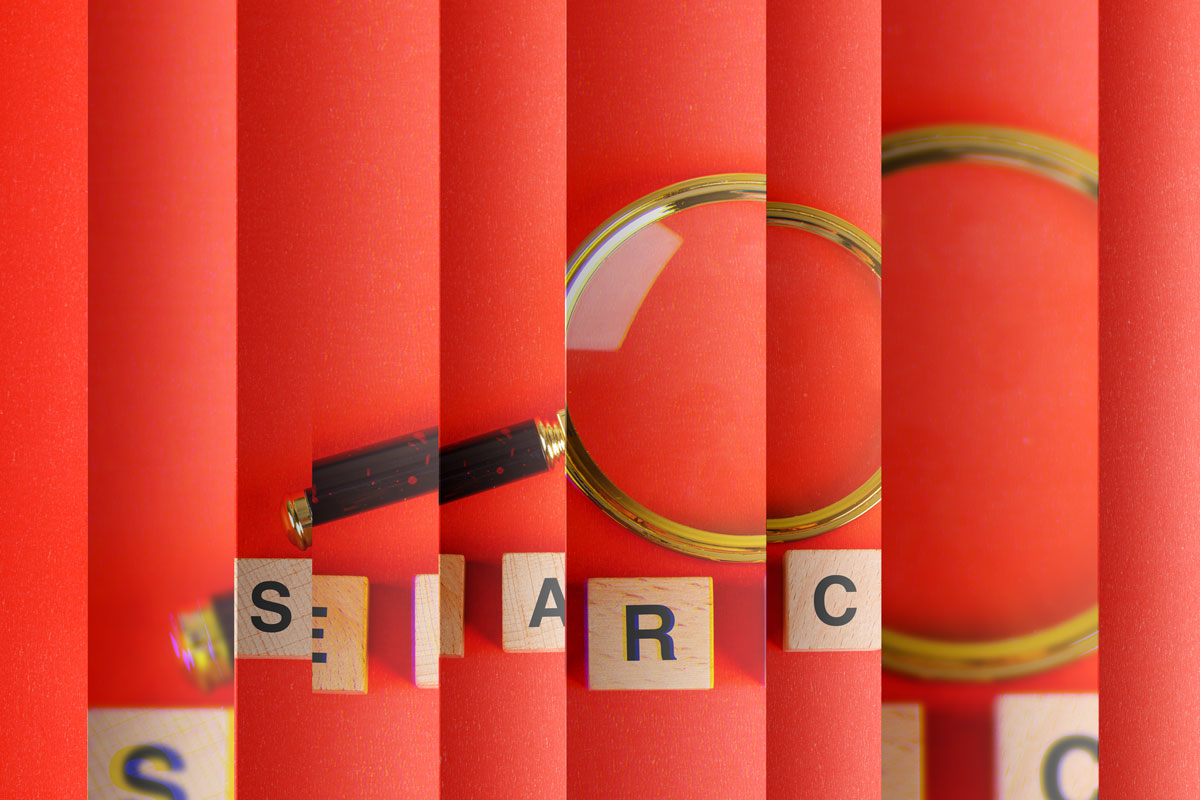 magnifying glass representing google search and how to optimize blog posts for SEO